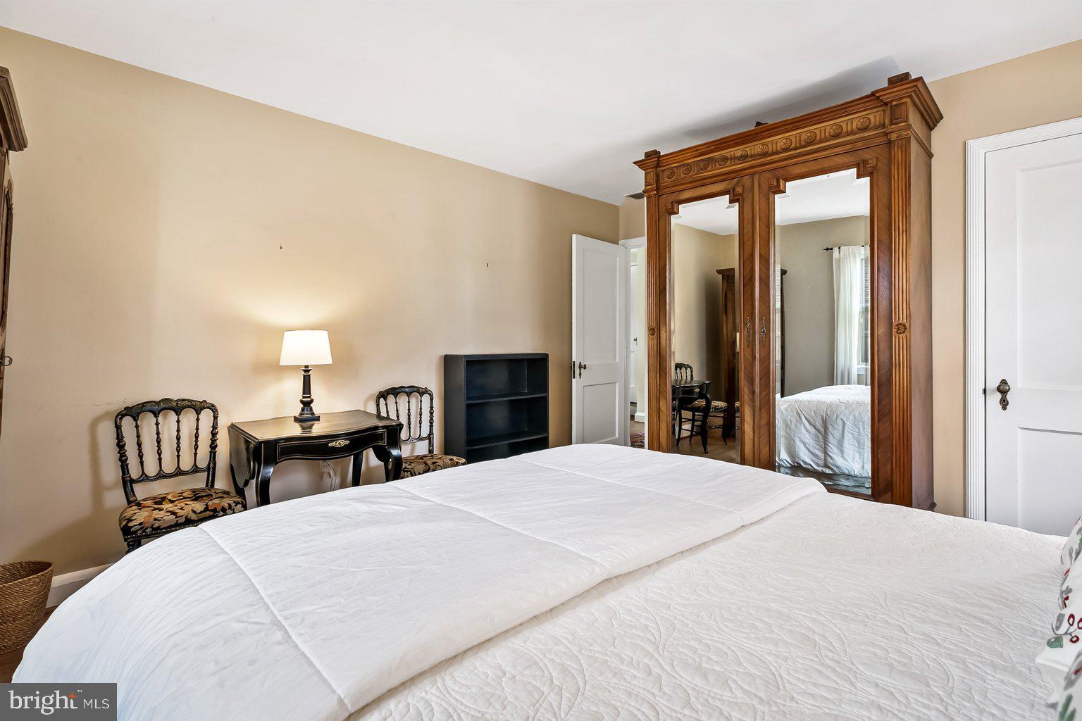 620 Overbrook Road Baltimore, MD 21212 - Photo 41 of 53 a bedroom with a bed and a table