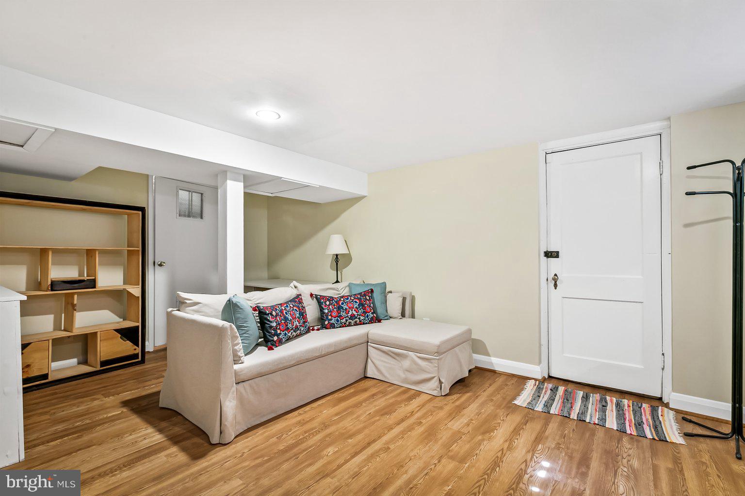 620 Overbrook Road Baltimore, MD 21212 - Photo 49 of 53 a living room with furniture and a wooden floor