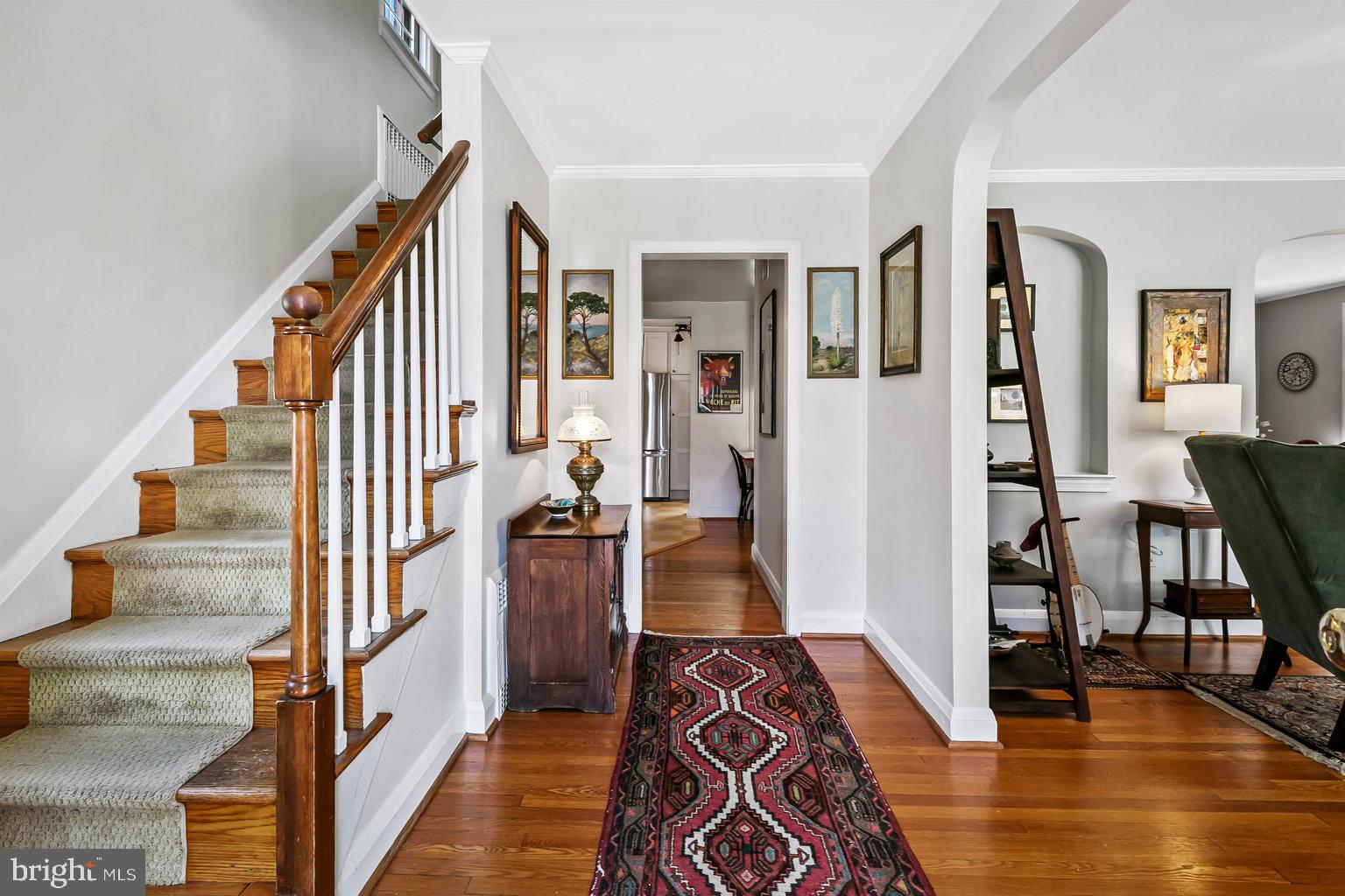 620 Overbrook Road Baltimore, MD 21212 - Photo 6 of 53 a view of a hallway with furniture and wooden floor