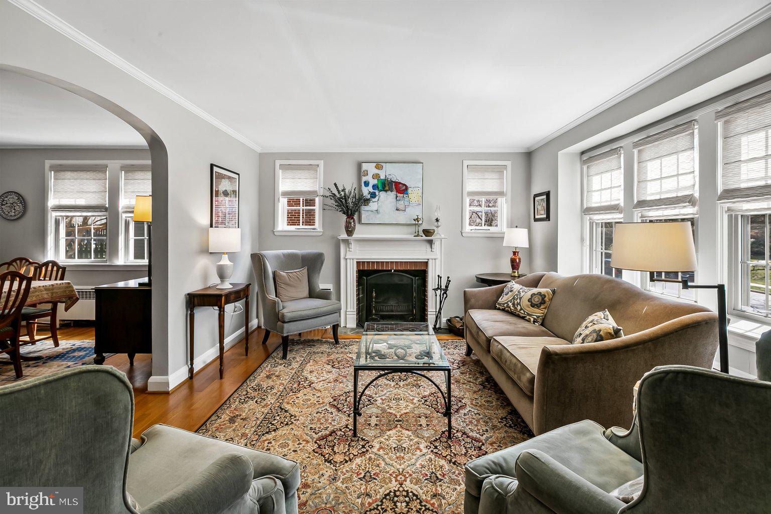620 Overbrook Road Baltimore, MD 21212 - Photo 9 of 53 a living room with furniture and a fireplace