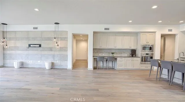 an empty room with a bench