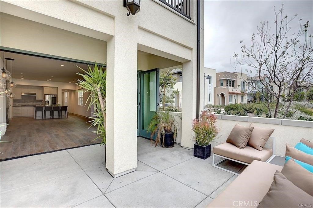 115 Fixie Irvine, CA 92618 - Photo 28 of 29 a view of living room kitchen with furniture and a potted plant