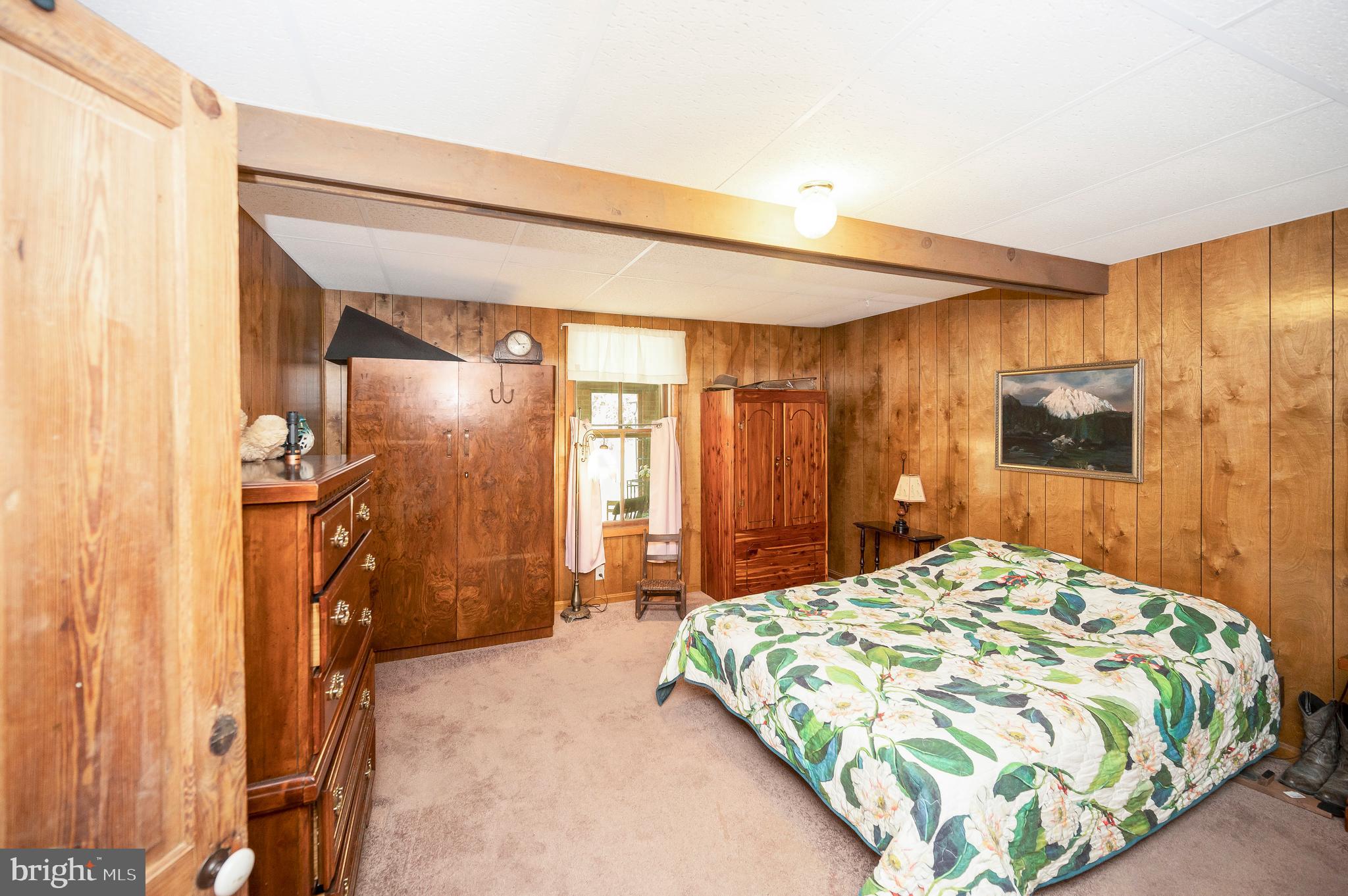 31934 Indiantown Road Locust Grove, VA 22508 - Photo 12 of 60 a bedroom with a bed and a mirror