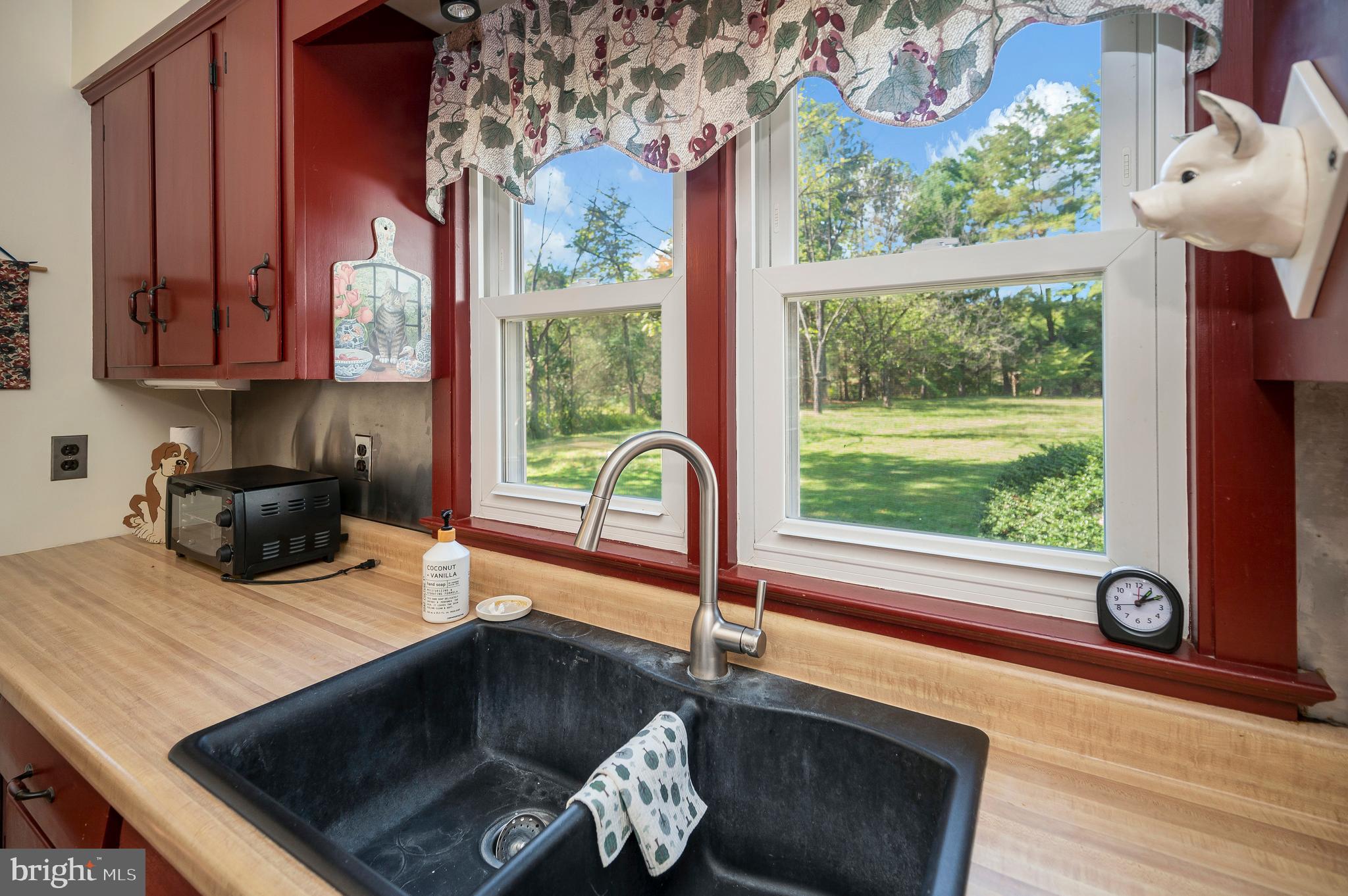 31934 Indiantown Road Locust Grove, VA 22508 - Photo 24 of 60 a kitchen with a sink a counter top space and a window
