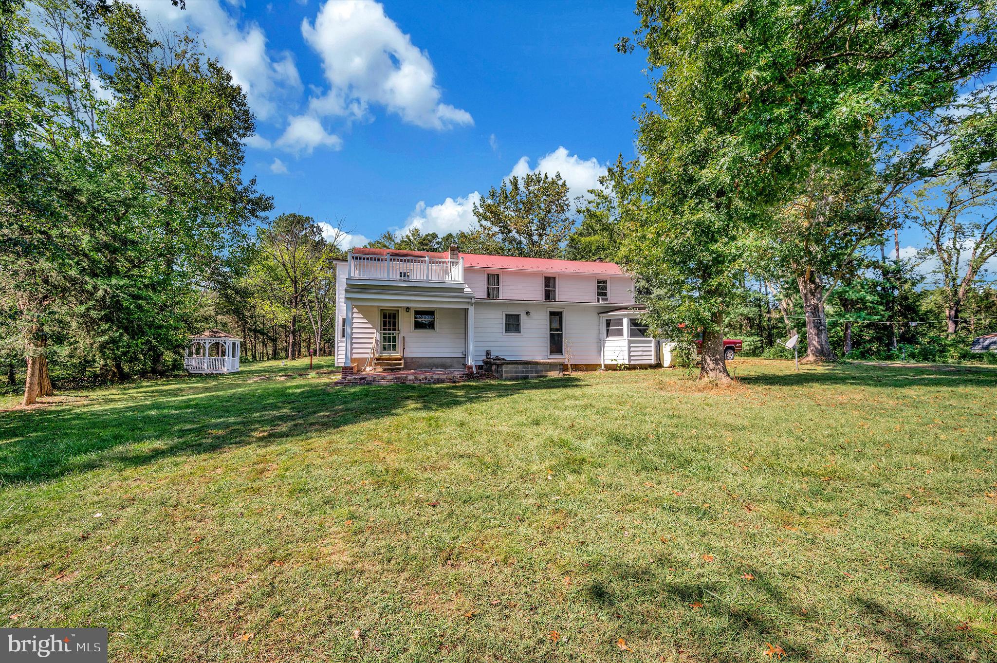 31934 Indiantown Road Locust Grove, VA 22508 - Photo 28 of 60 a view of a house with a yard balcony