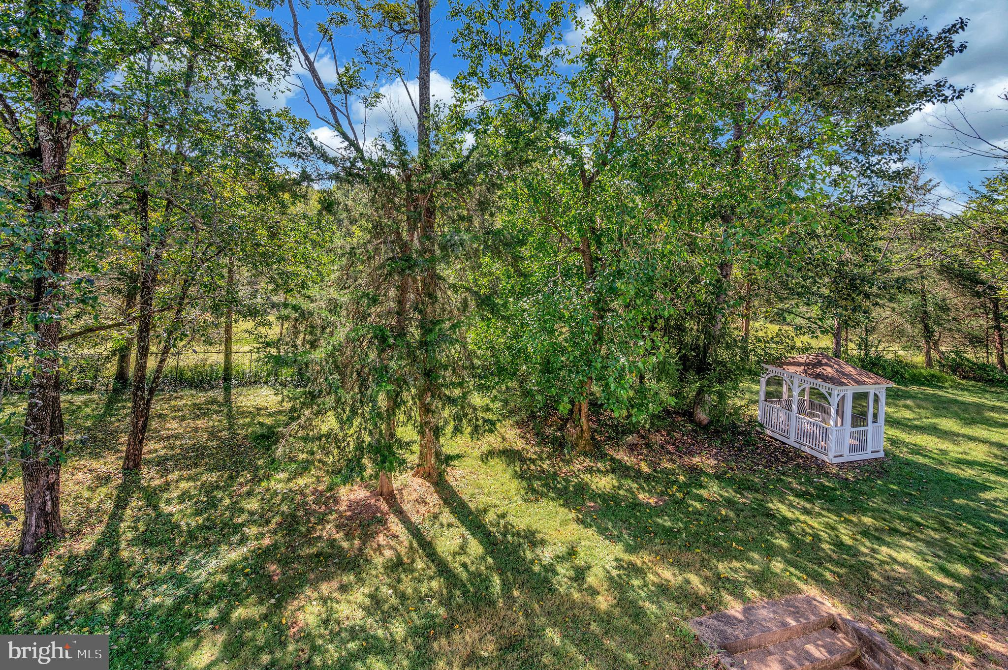 31934 Indiantown Road Locust Grove, VA 22508 - Photo 42 of 60 a sign that is sitting in front of a tree
