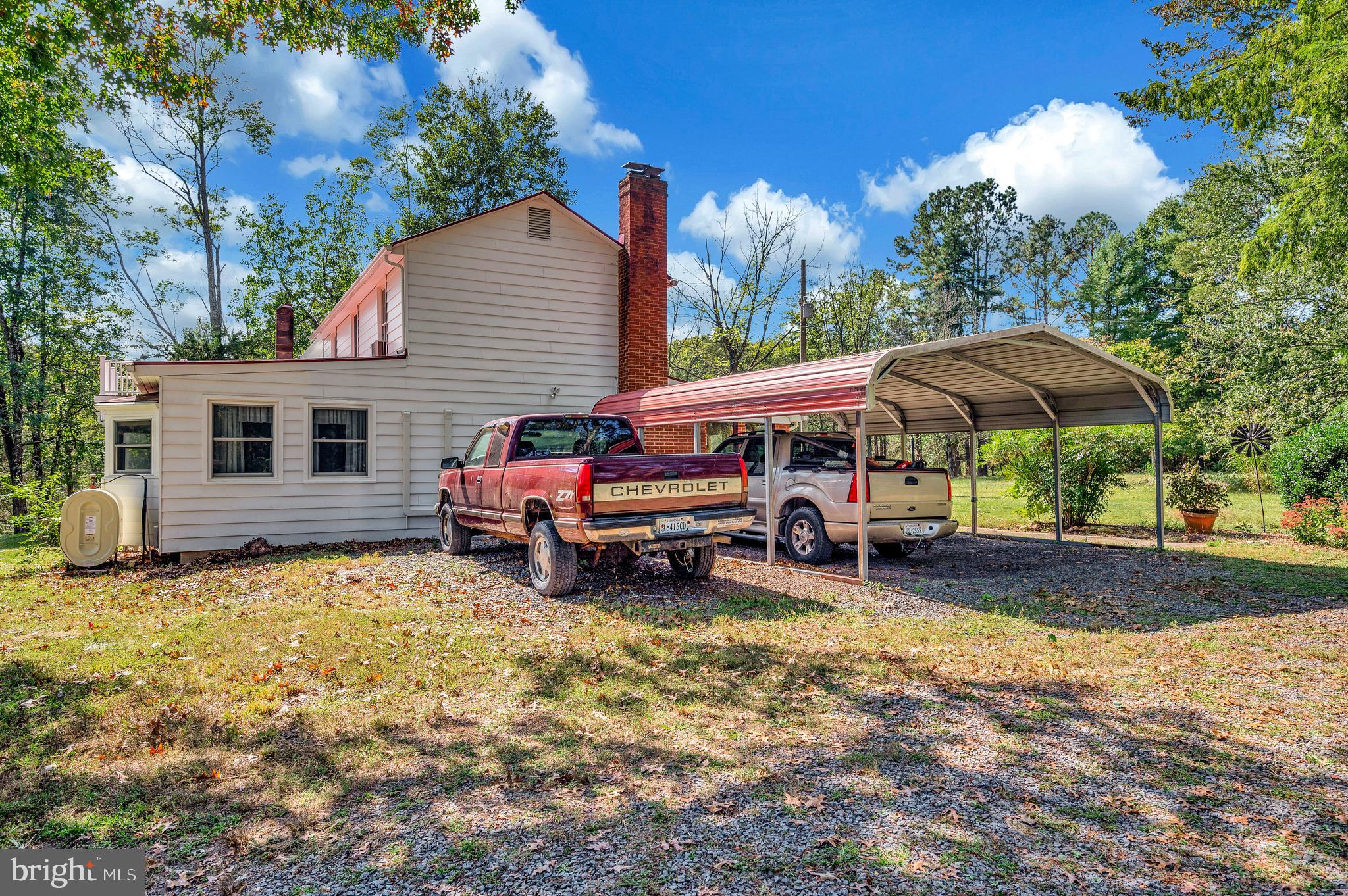 31934 Indiantown Road Locust Grove, VA 22508 - Photo 45 of 60 a view of a house with backyard and sitting area