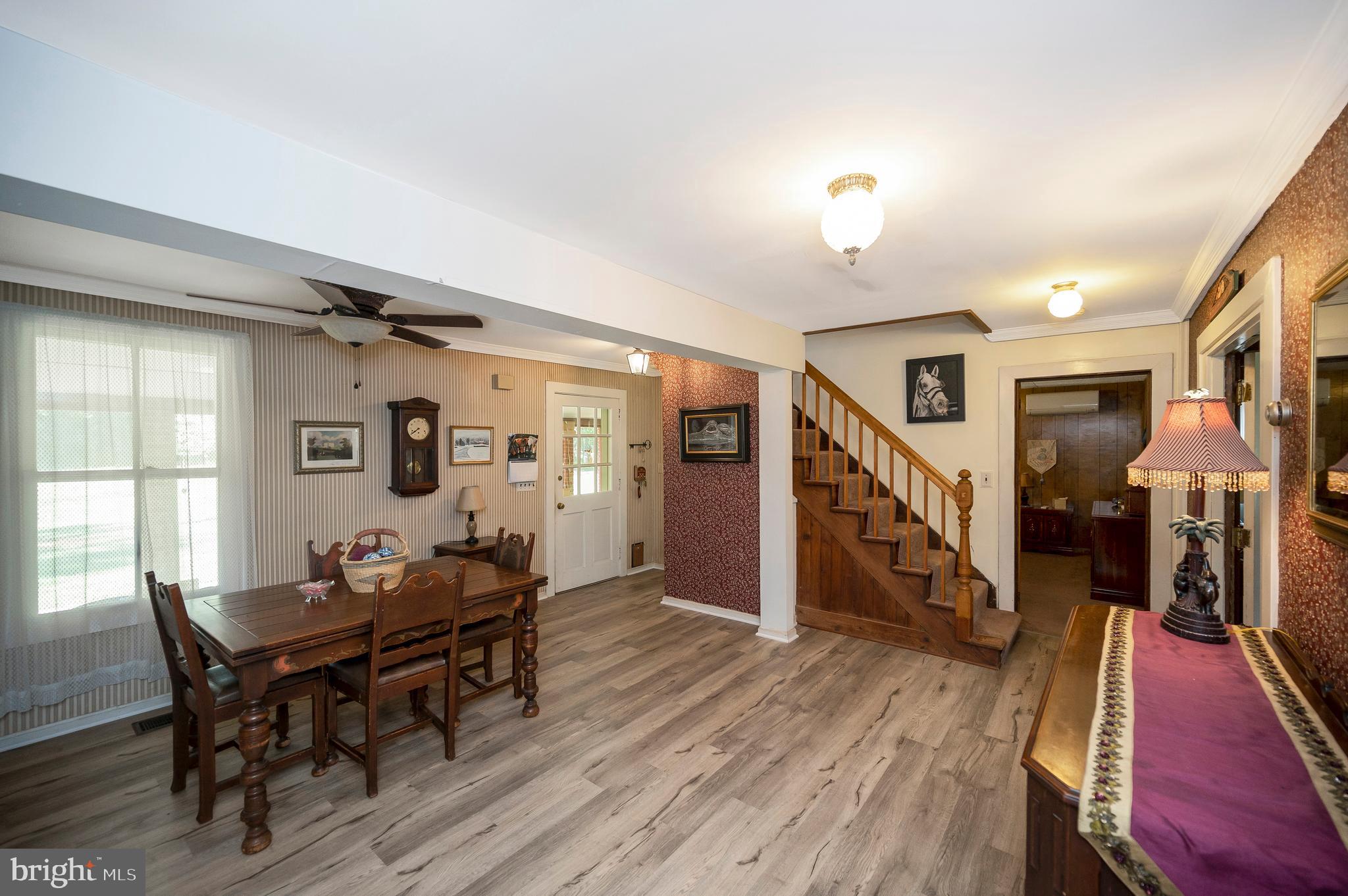 31934 Indiantown Road Locust Grove, VA 22508 - Photo 10 of 60 a dining room with furniture and wooden floor