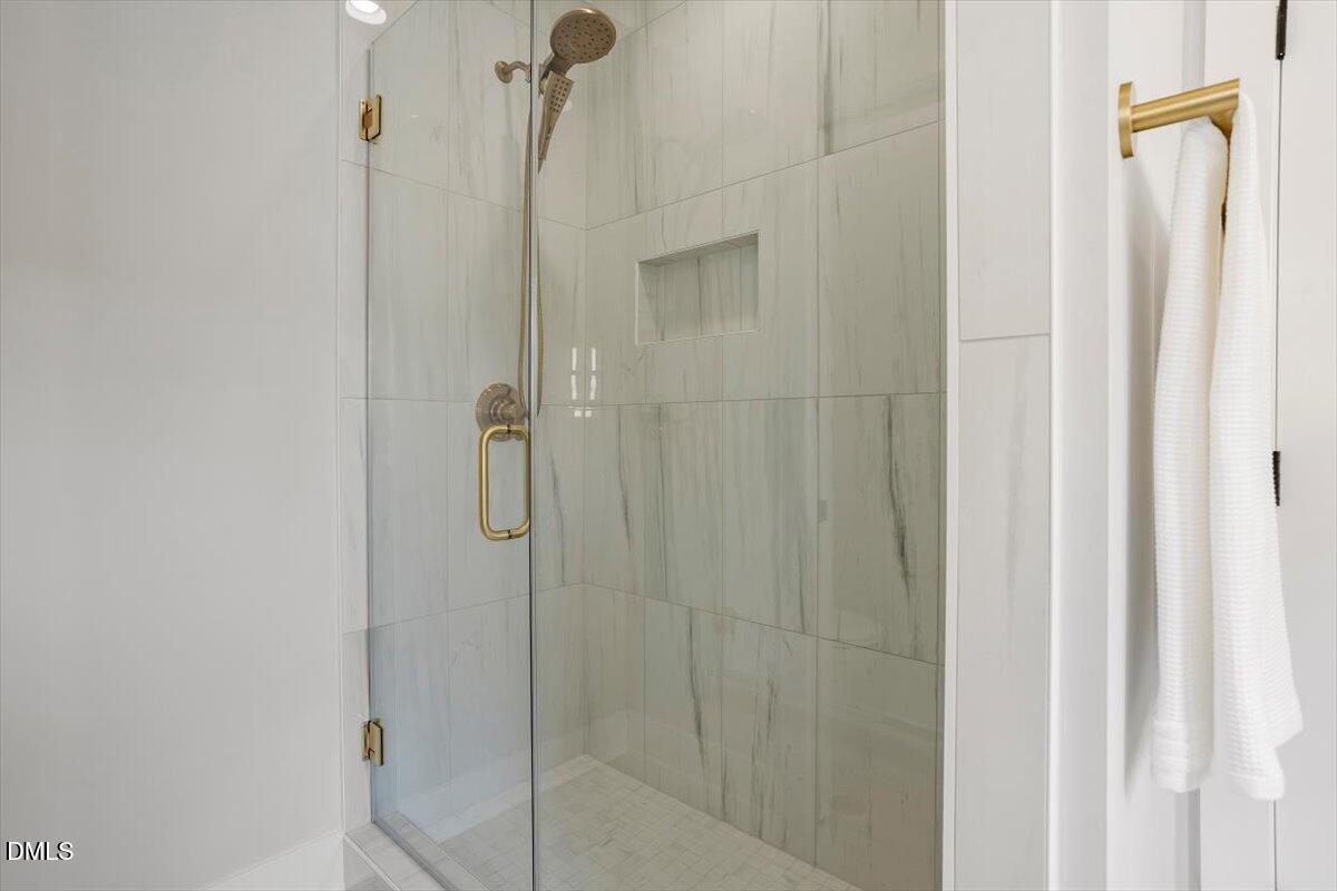 811 Maple Berry Lane, Unit 101 Raleigh, NC 27607 - Photo 27 of 45 a bathroom with a shower