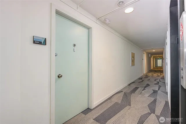 a view of a living room and dining room