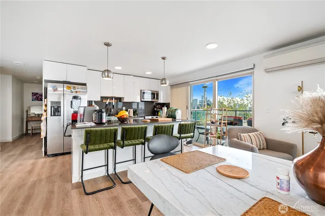 a view of a chairs and table in patio
