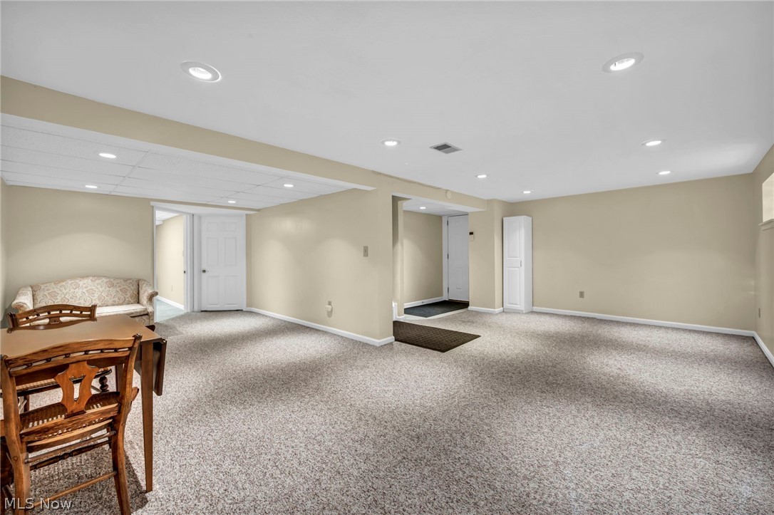 1057 Congress Lake Road Mogadore, OH 44260 - Photo 34 of 50 L-shaped basement rec room