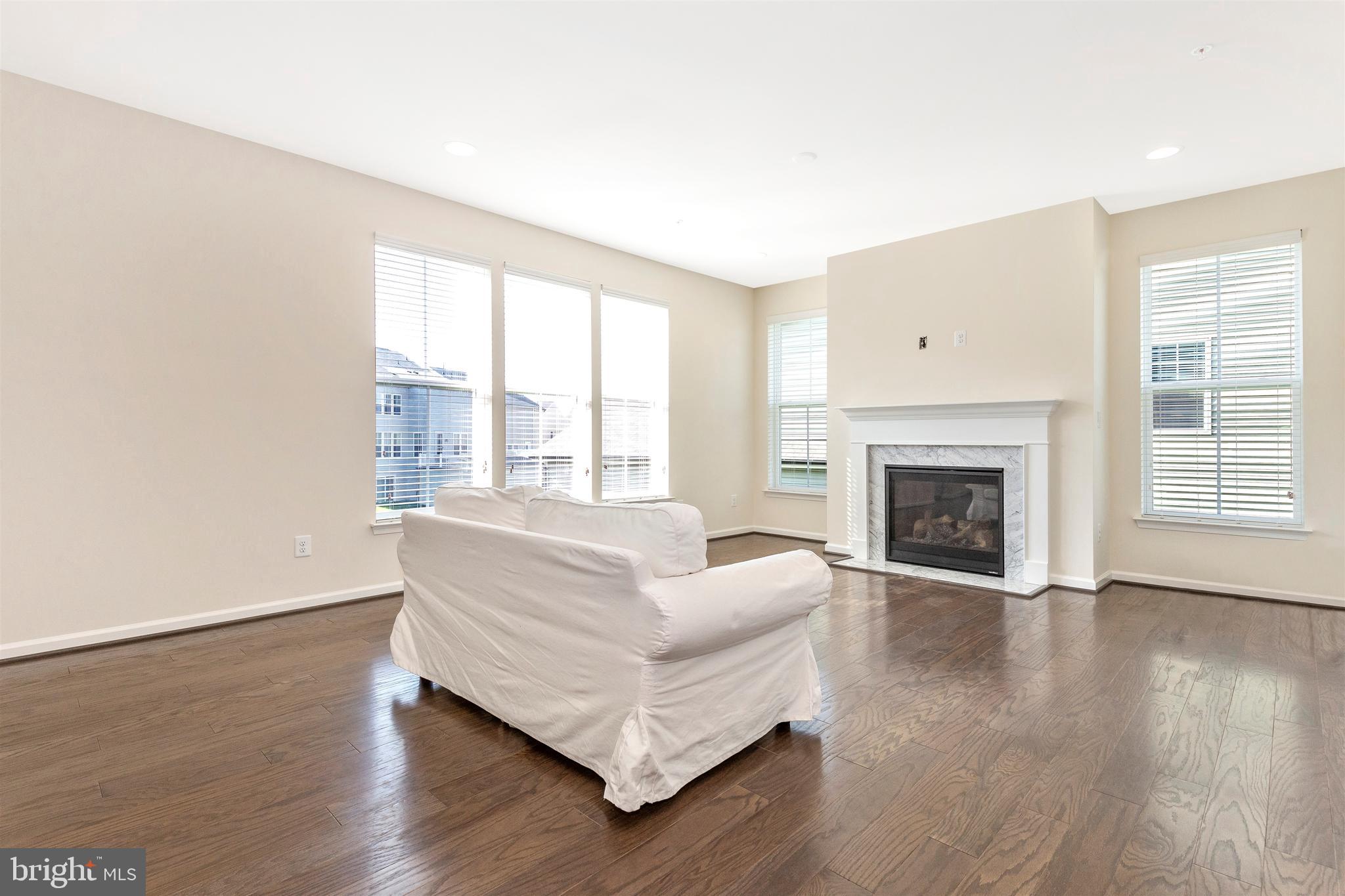 8407 Pine Bluff Road Frederick, MD 21704 - Photo 20 of 77 Gas fireplace and lots of natural light