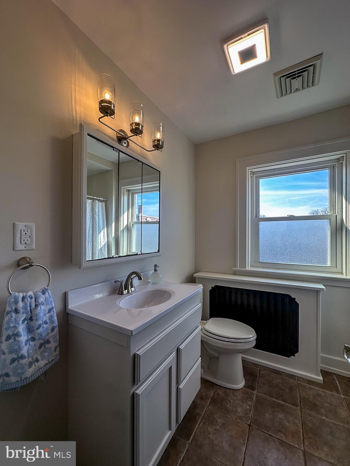 36 North College Street Palmyra, PA 17078 - Photo 31 of 63 a bathroom with a sink and a mirror