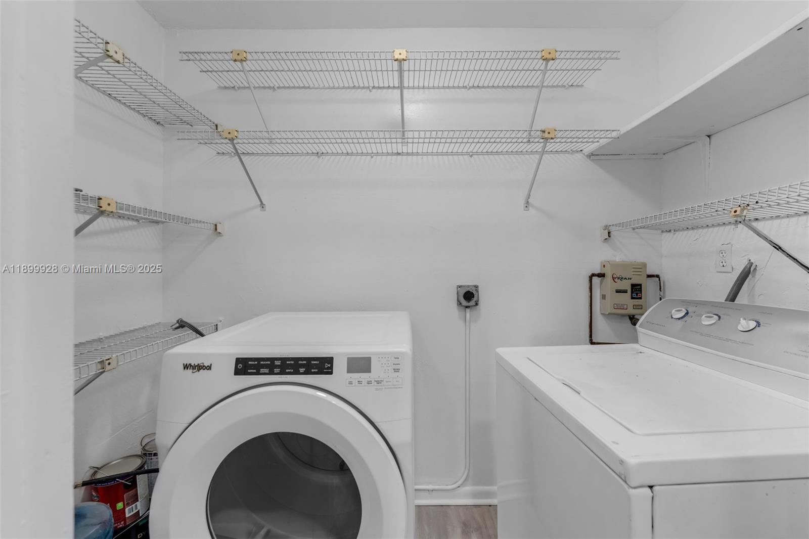12820 Southwest 43rd Drive, Unit 233B Miami, FL 33175 - Photo 15 of 22 a utility room with dryer and washer