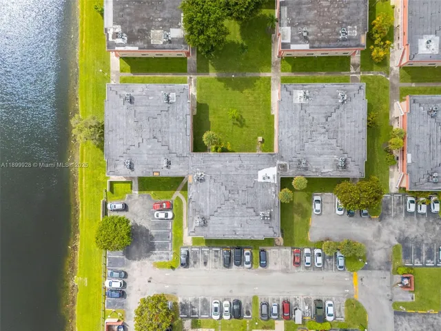 an aerial view of a house with a garden