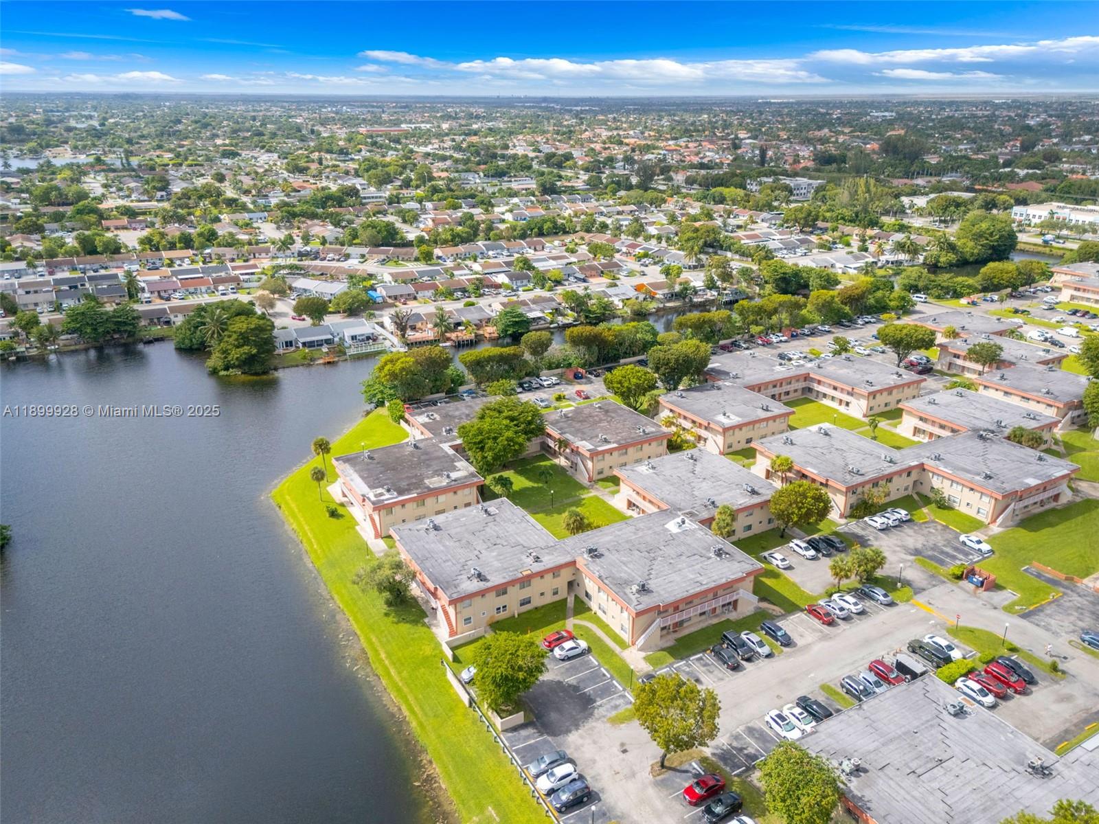 12820 Southwest 43rd Drive, Unit 233B Miami, FL 33175 - Photo 22 of 22 an aerial view of residential houses with outdoor space and ocean view