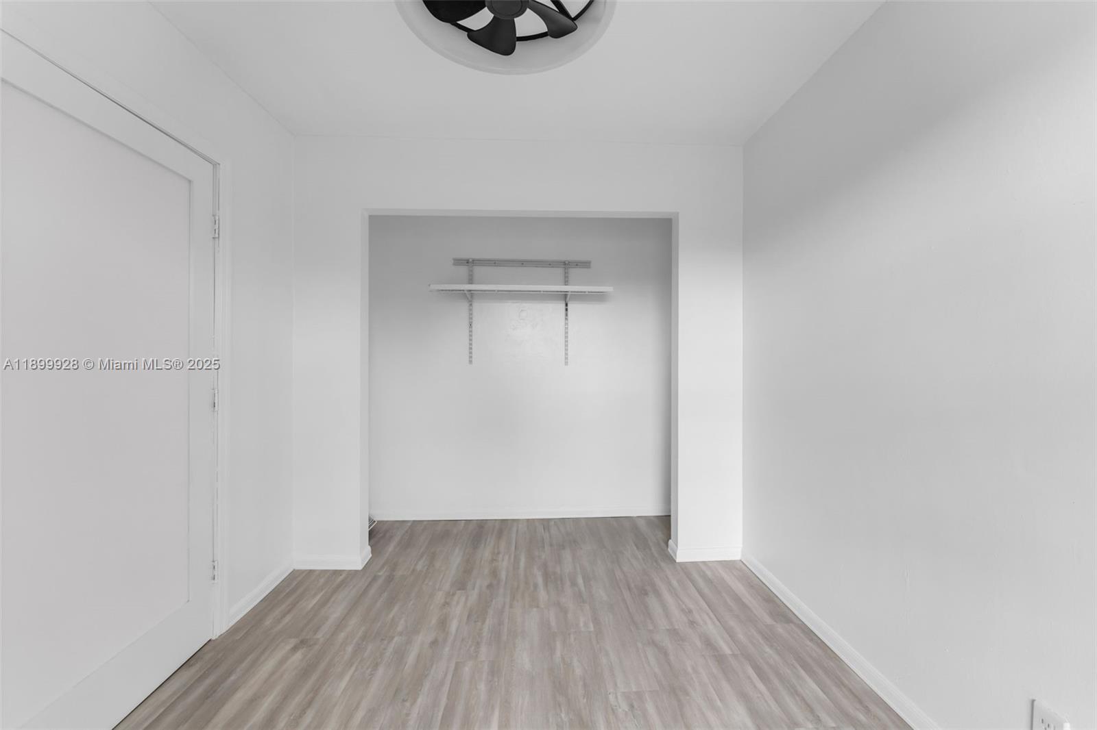 12820 Southwest 43rd Drive, Unit 233B Miami, FL 33175 - Photo 4 of 22 a view of a room with wooden floor