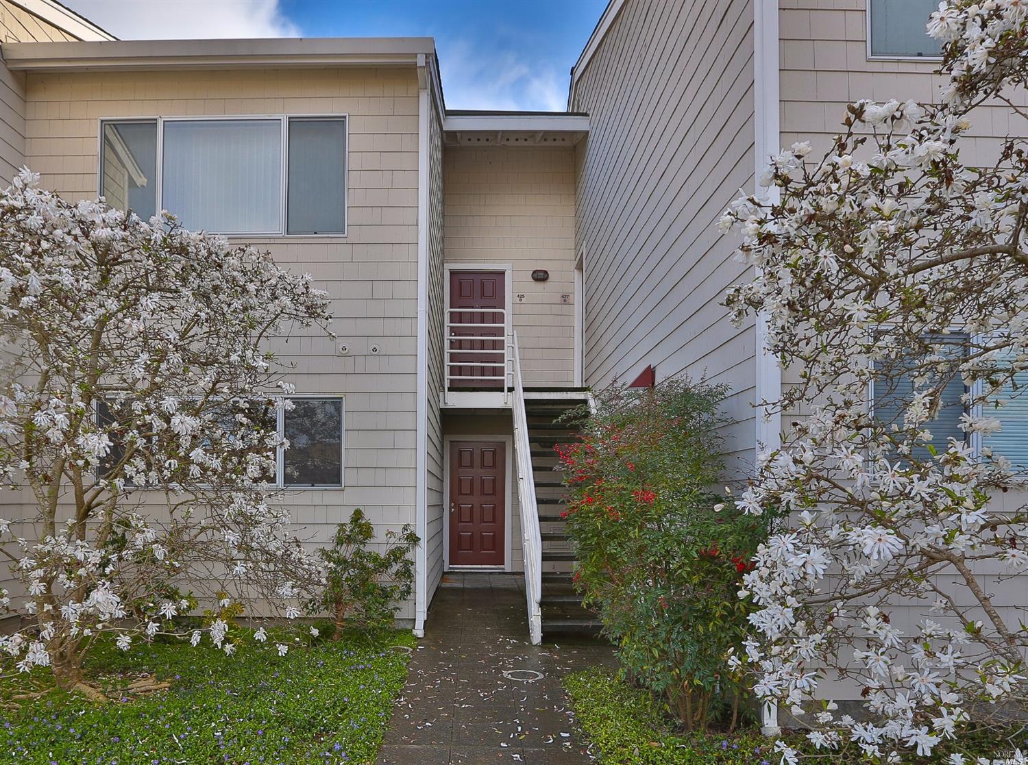 425 Enfrente Road, Unit A Novato, CA 94949 - Photo 1 of 1 front view of a house with a garden