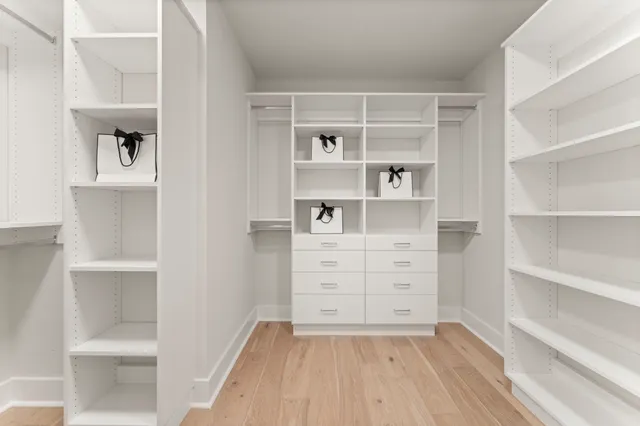 a view of an empty walk in closet