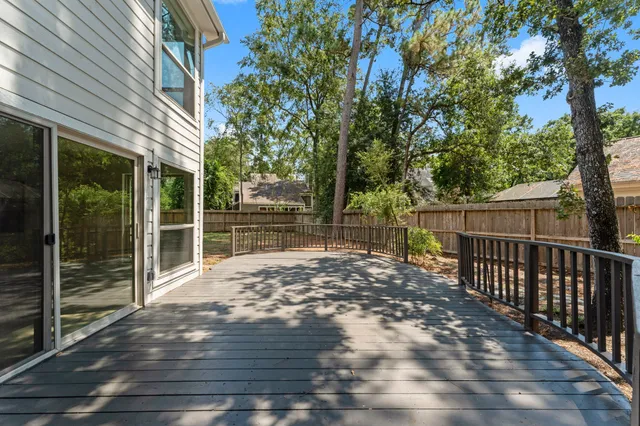 a view of backyard with green space