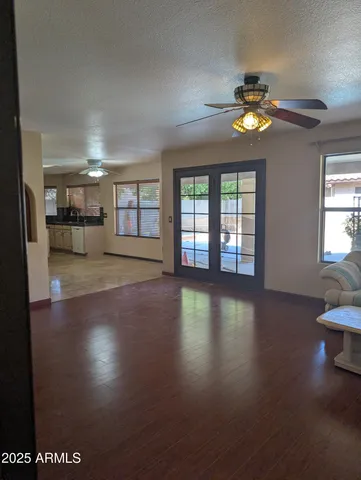 a kitchen with cabinets and stainless steel appliances