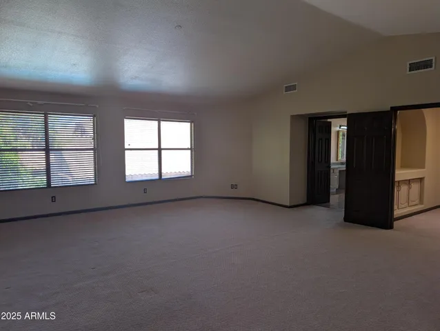 a bathroom with a shower and a bathtub