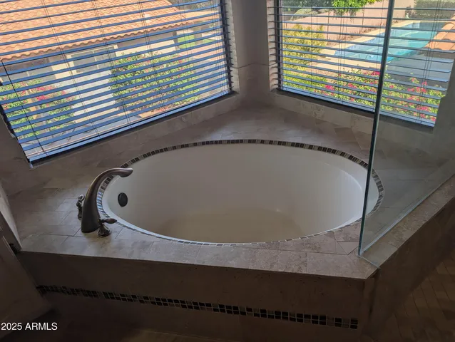 a view of an empty room and a room