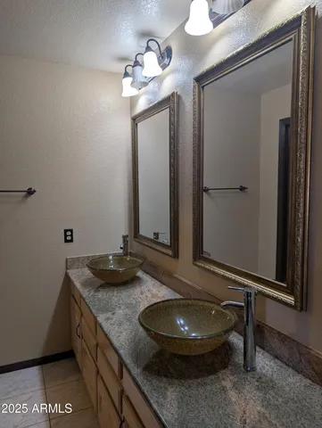 a bathroom with a shower and toilet