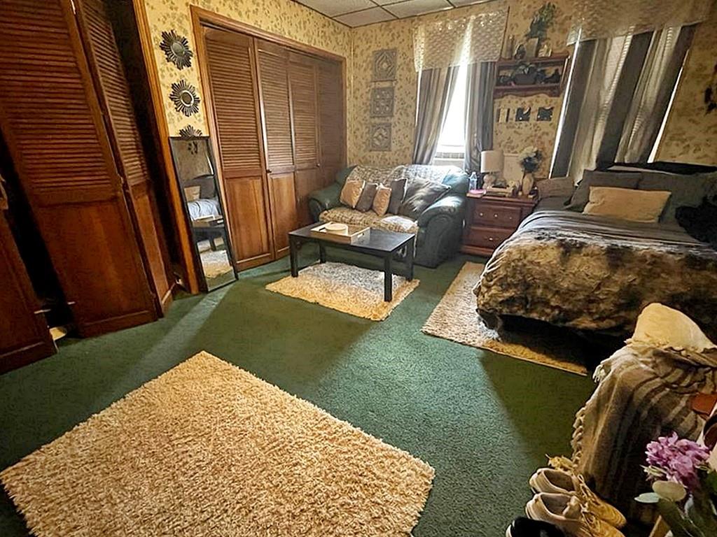 412 Shingiss Street McKees Rocks, PA 15136 - Photo 6 of 14 a living room with furniture and a rug
