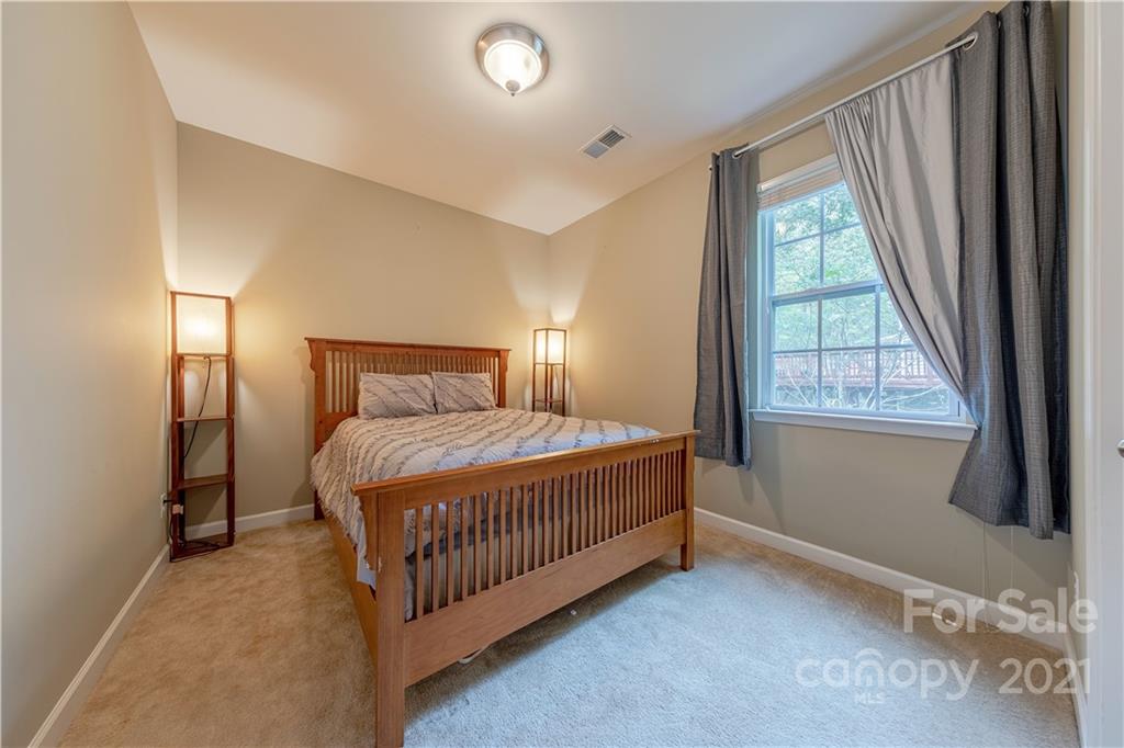 303 Lorraine Road Fort Mill, SC 29708 - Photo 14 of 30 a bedroom with a bed and window