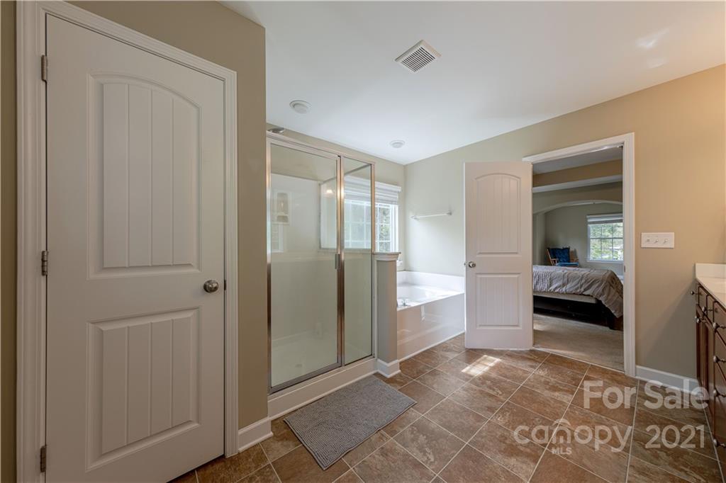 303 Lorraine Road Fort Mill, SC 29708 - Photo 21 of 30 a view of bedroom with furniture and shower