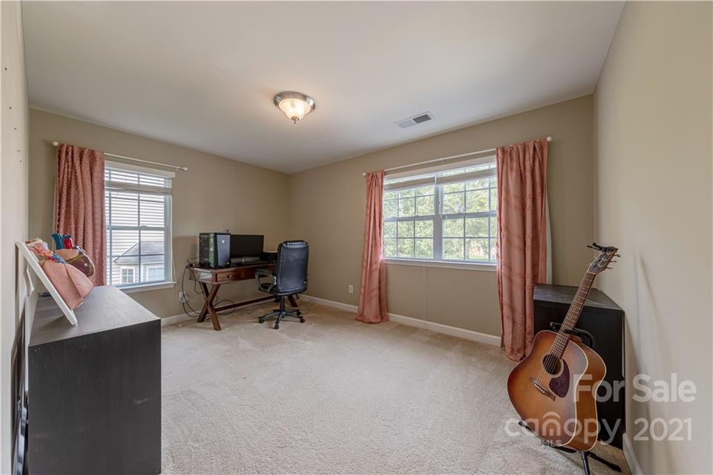 303 Lorraine Road Fort Mill, SC 29708 - Photo 23 of 30 a living room with furniture and a window
