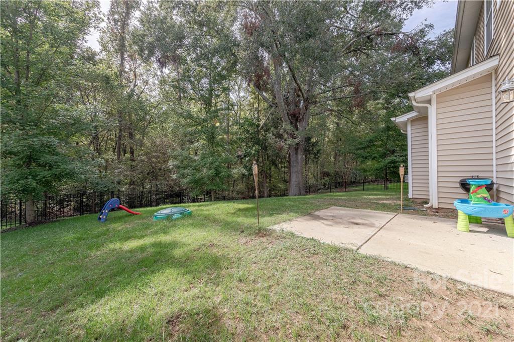 303 Lorraine Road Fort Mill, SC 29708 - Photo 29 of 30 a view of a backyard with a small cabin