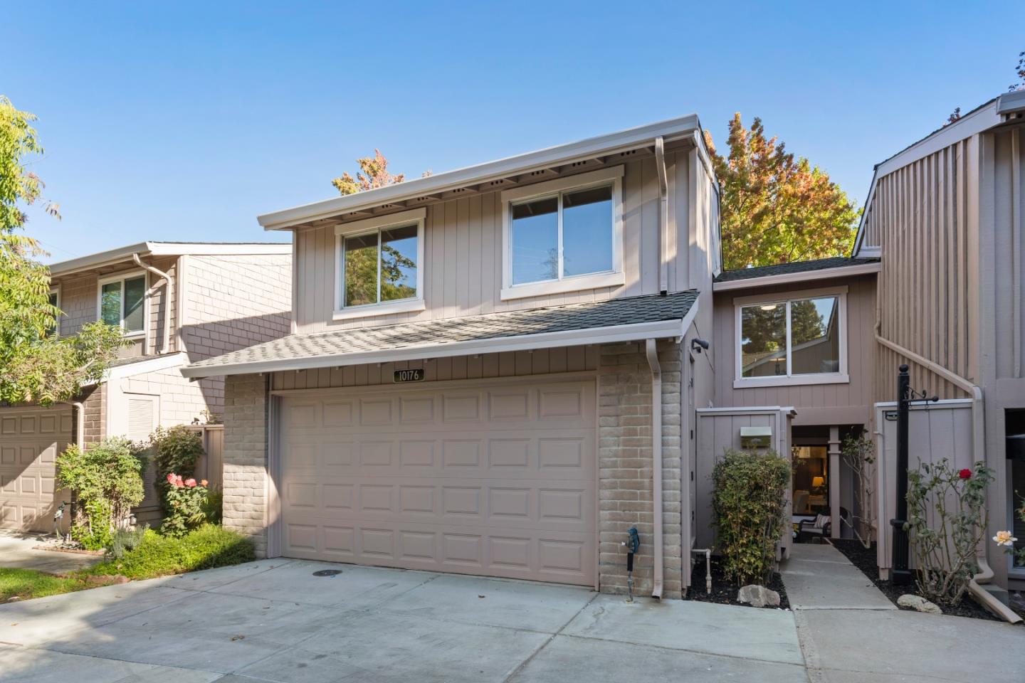 10176 Camberley Lane Cupertino, CA 95014 - Photo 21 of 22 a front view of a house with garden