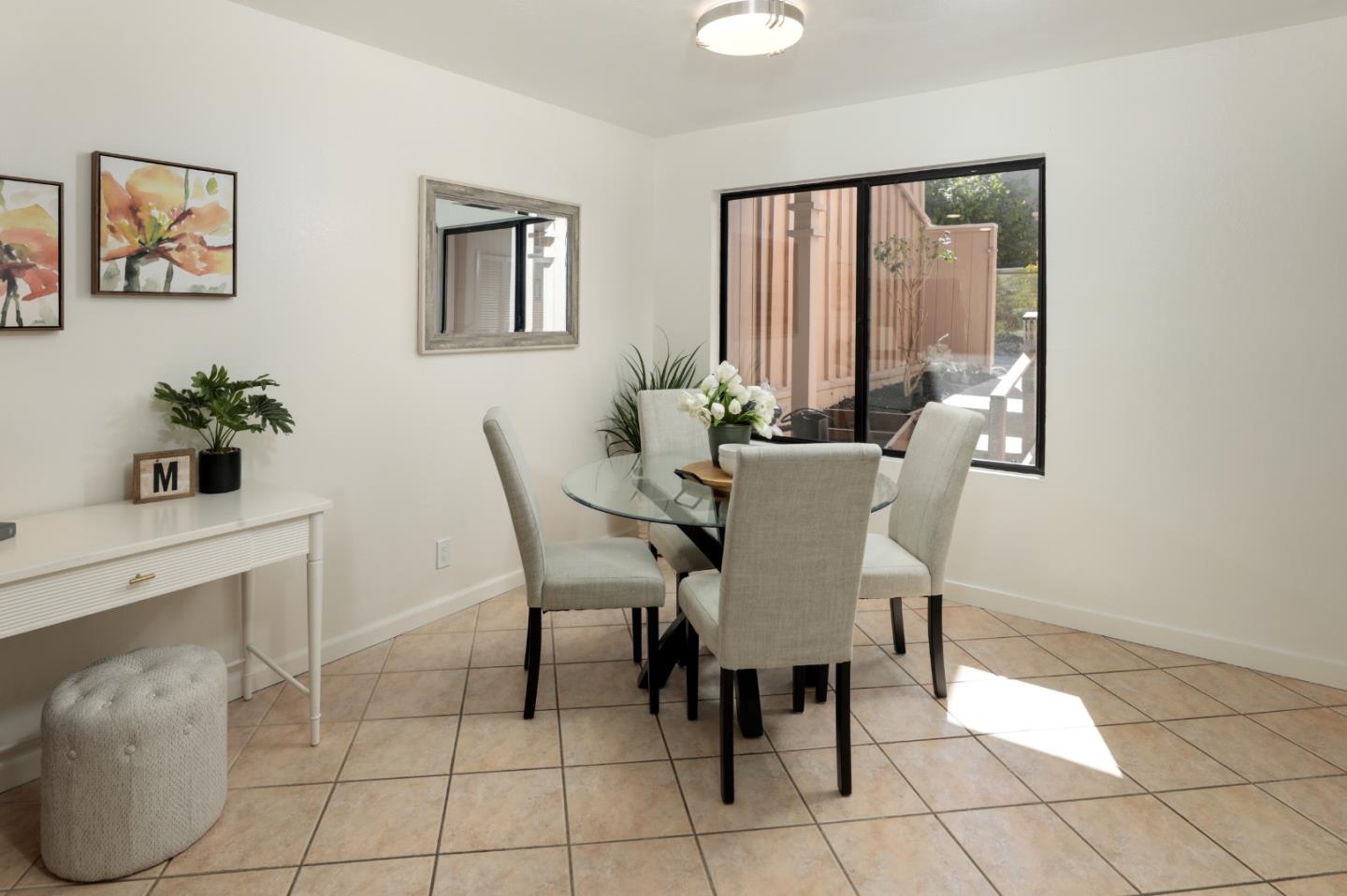 10176 Camberley Lane Cupertino, CA 95014 - Photo 7 of 22 a dining room with furniture and window