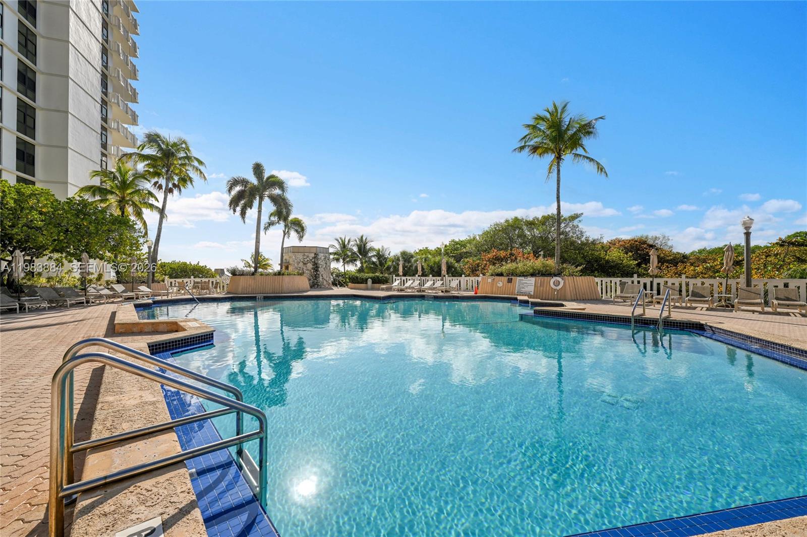 1111 Crandon Boulevard, Unit C504 Key Biscayne, FL 33149 - Photo 13 of 18 a view of a lake with a house