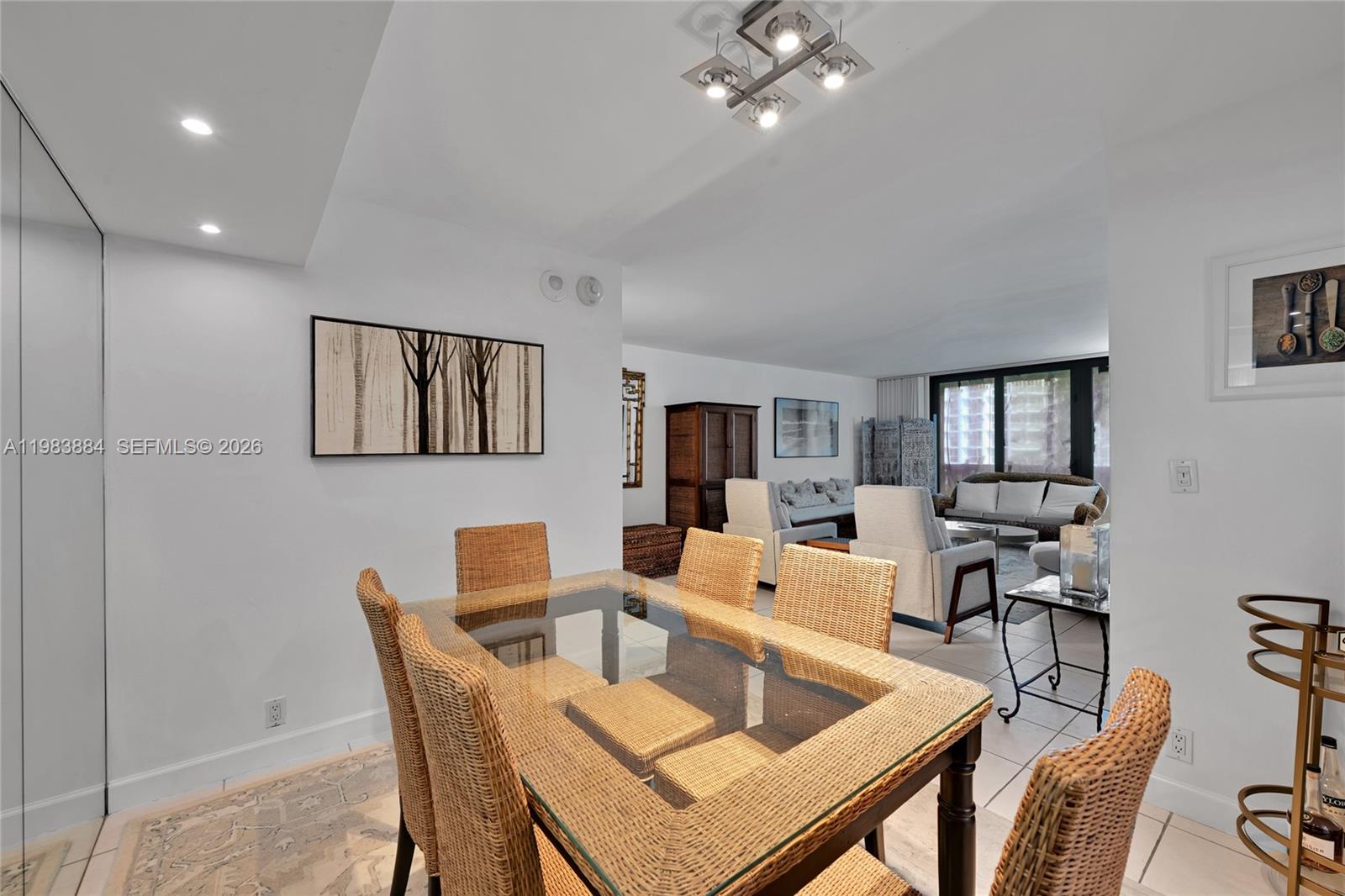 1111 Crandon Boulevard, Unit C504 Key Biscayne, FL 33149 - Photo 3 of 18 a view of a dining room with furniture