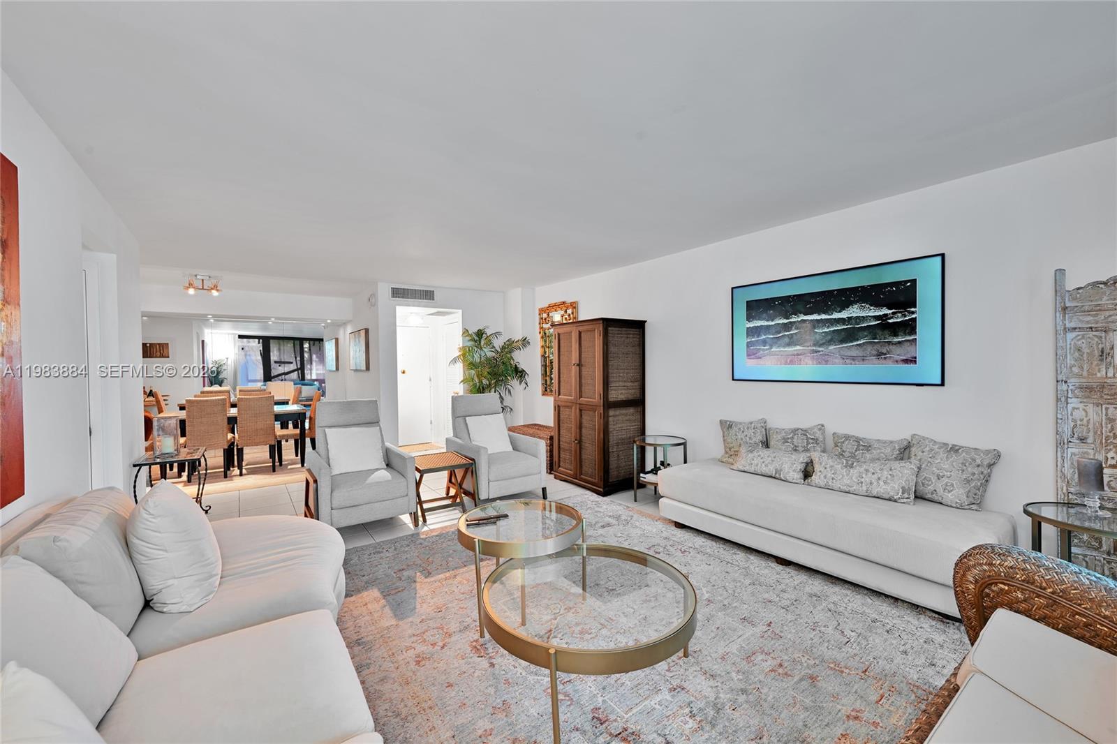 1111 Crandon Boulevard, Unit C504 Key Biscayne, FL 33149 - Photo 5 of 18 a living room with furniture and a wooden floor
