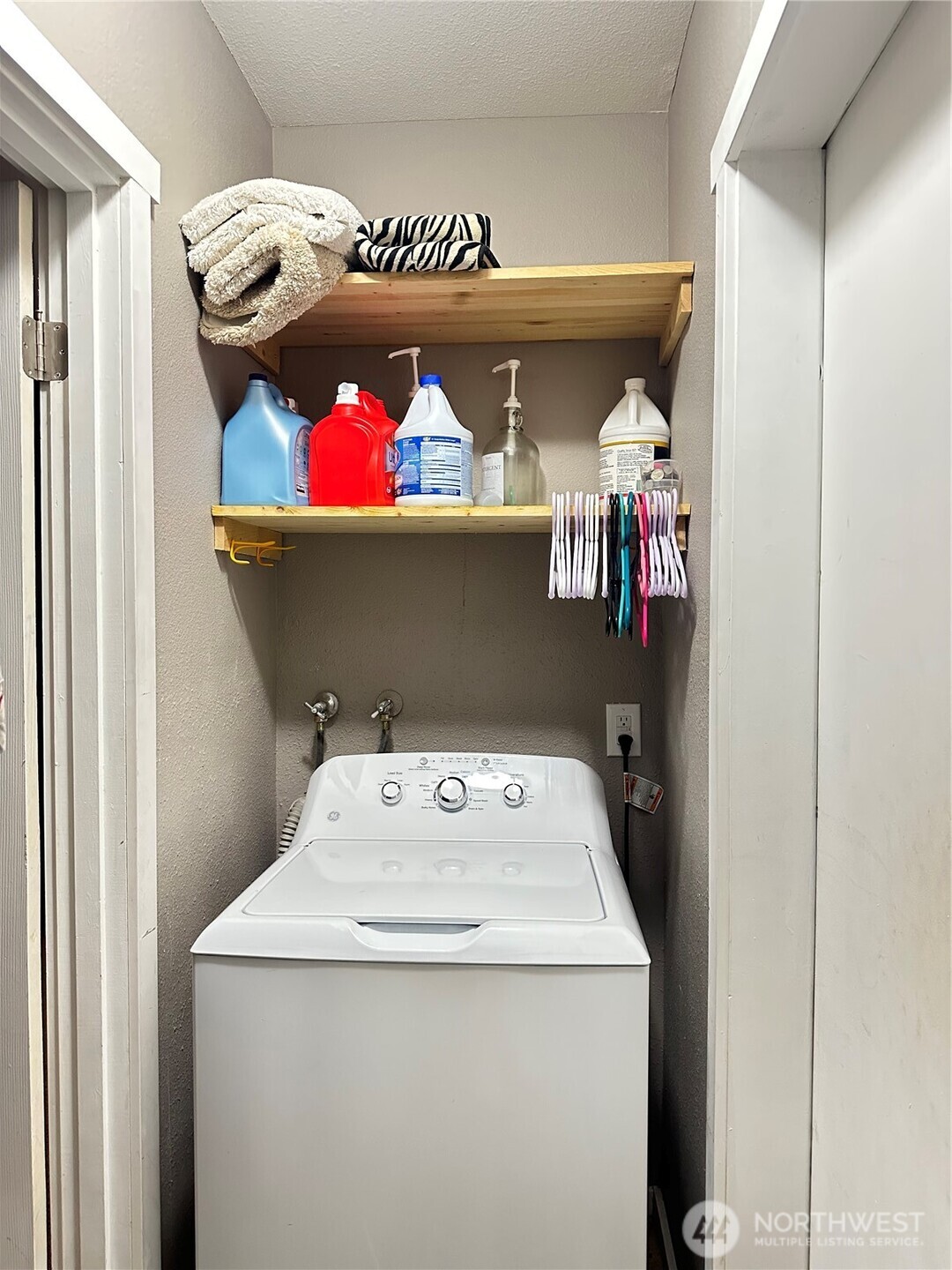 1723 Southwest 324th Street Federal Way, WA 98023 - Photo 11 of 21 a utility room with dryer and washer