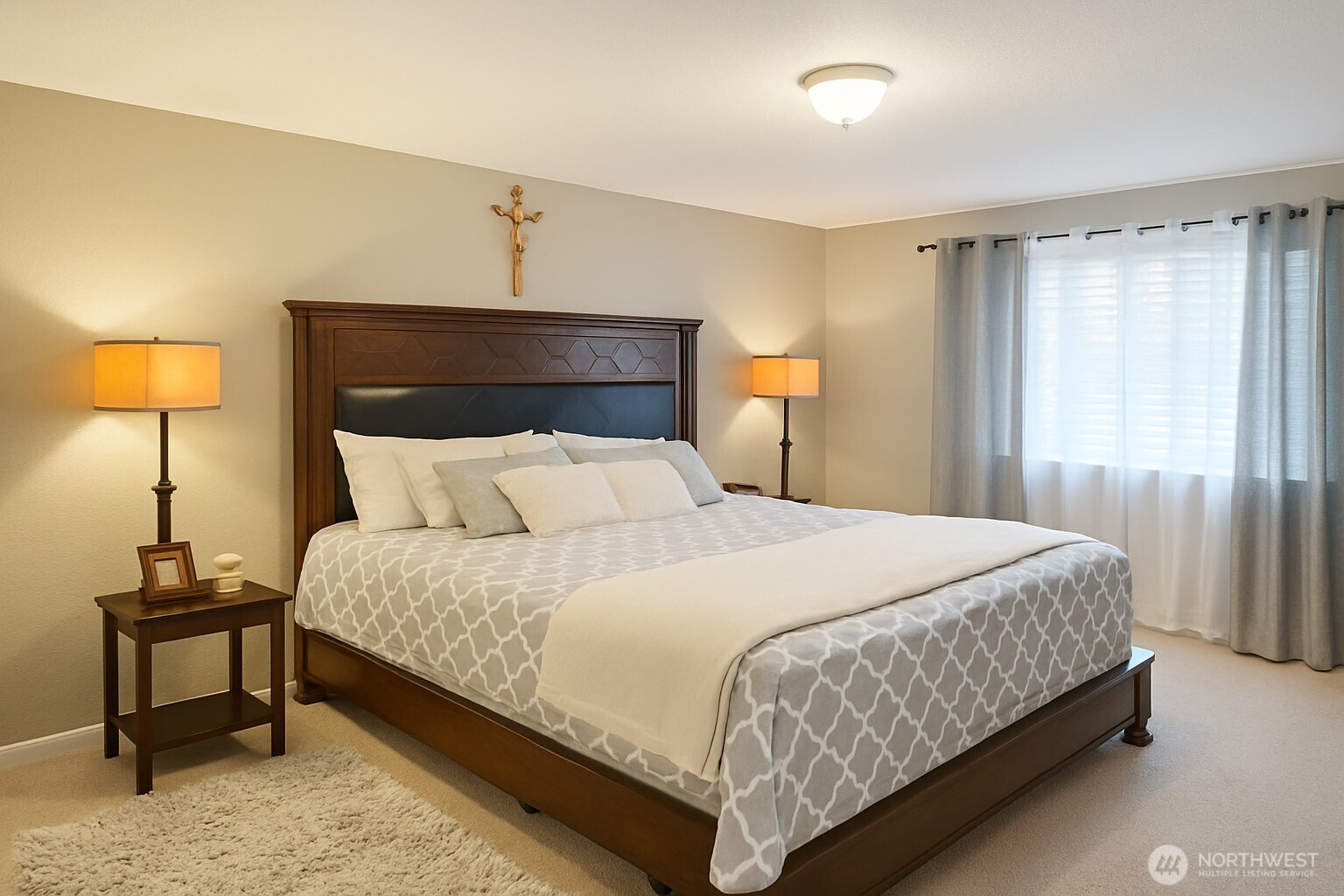 1723 Southwest 324th Street Federal Way, WA 98023 - Photo 12 of 21 a bedroom with a bed and a night stand