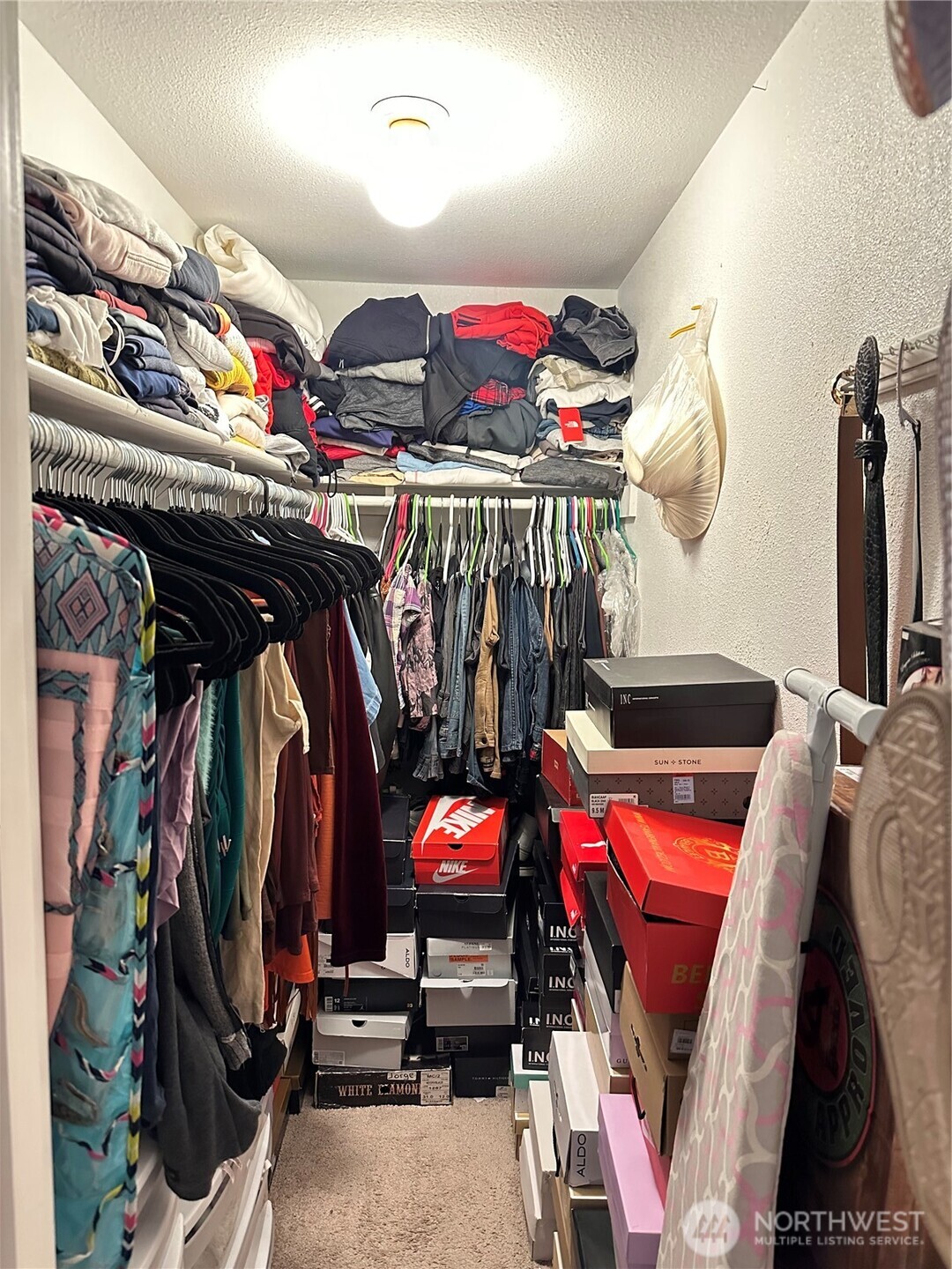 1723 Southwest 324th Street Federal Way, WA 98023 - Photo 15 of 21 a view of walk in closet with clothes and shoes
