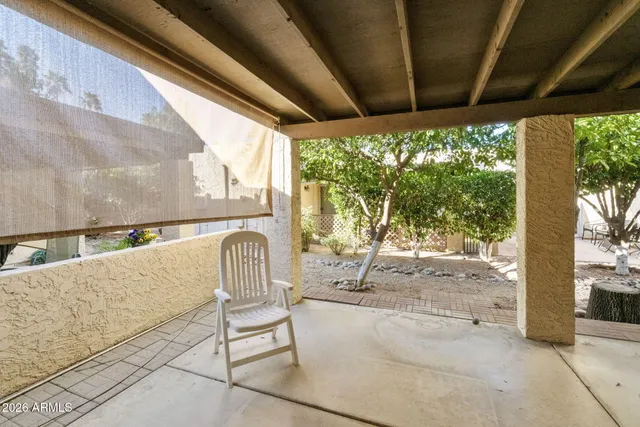 a spacious bathroom with a sink mirror and a bathtub