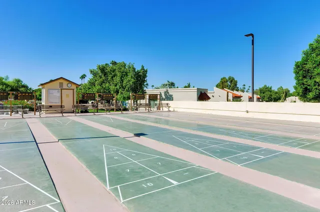 a view of swimming pool and outdoor seating