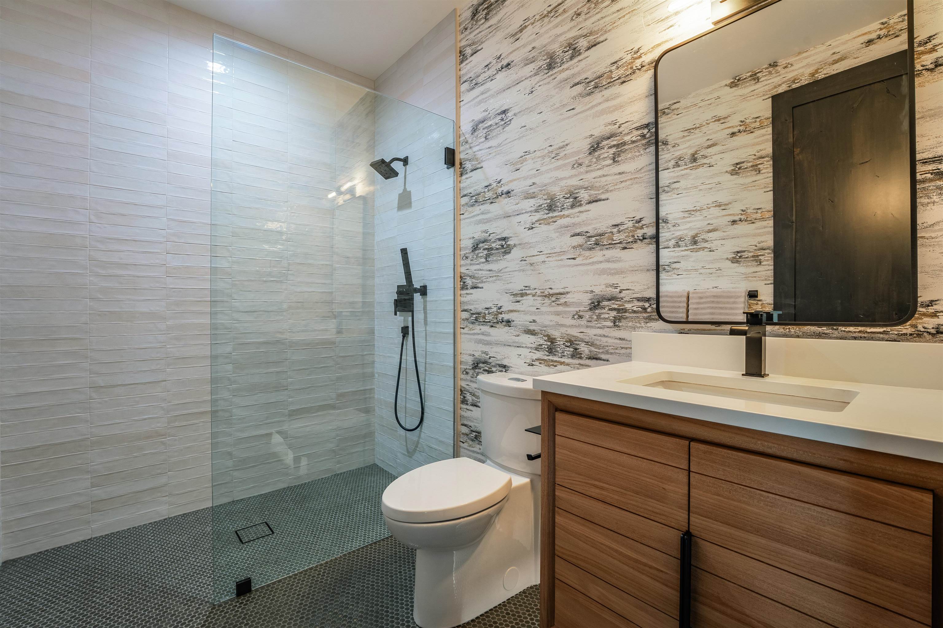 9090 Horned Lark Court Truckee, CA 96161 - Photo 14 of 28 a bathroom with a sink a toilet and shower