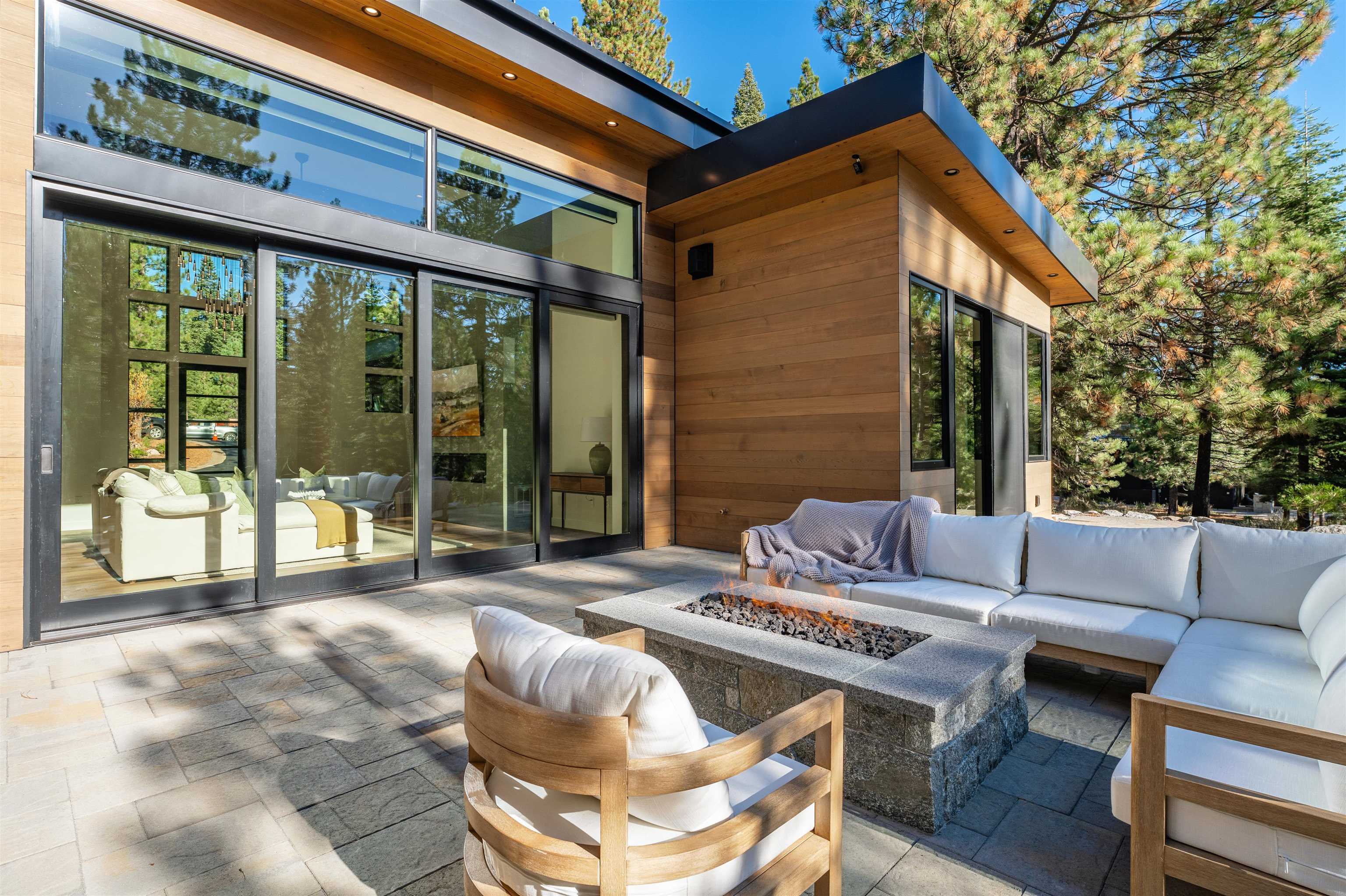 9090 Horned Lark Court Truckee, CA 96161 - Photo 23 of 28 a outdoor living space with patio furniture and a wooden floor