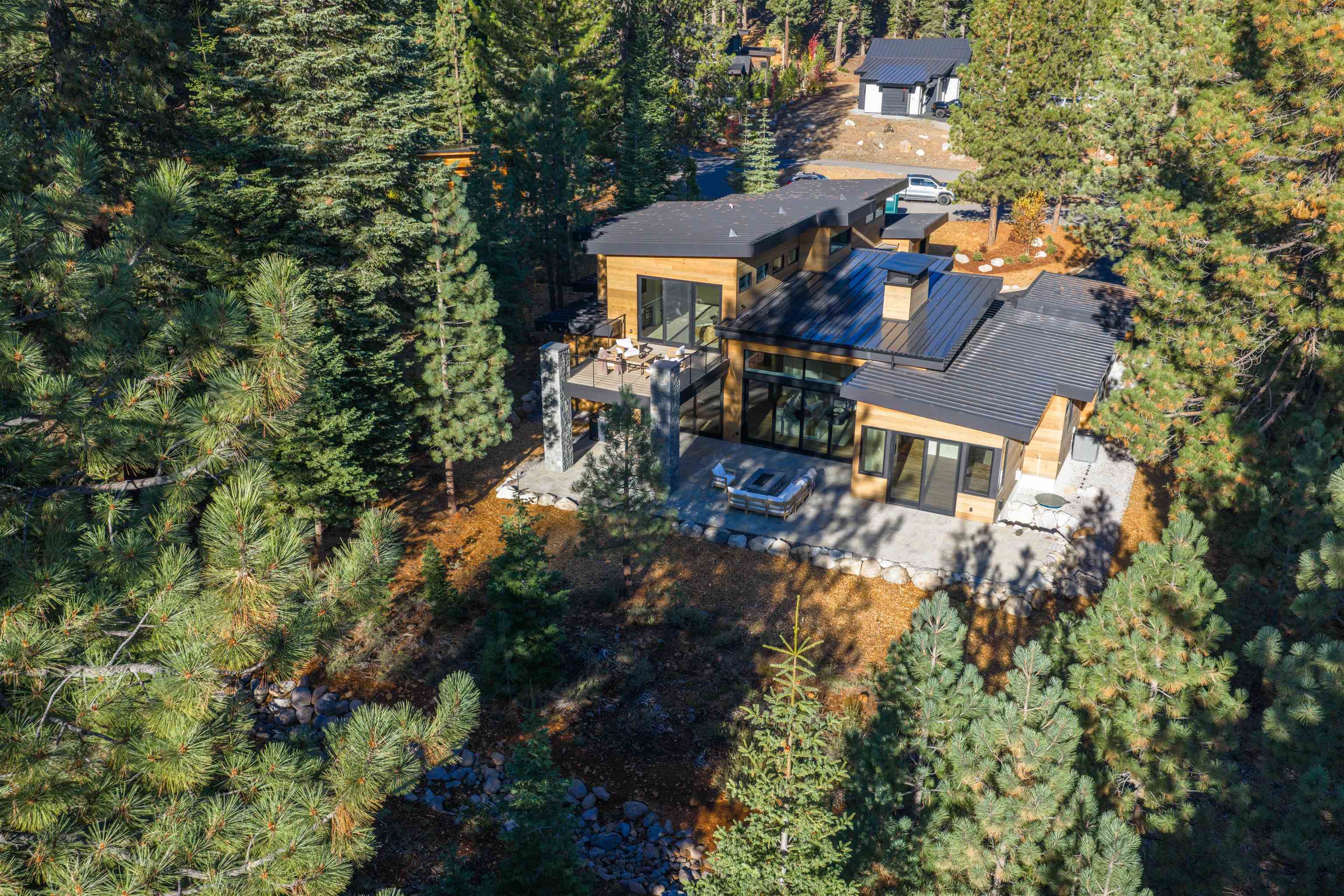 9090 Horned Lark Court Truckee, CA 96161 - Photo 28 of 28 a aerial view of a house with a yard and sitting area