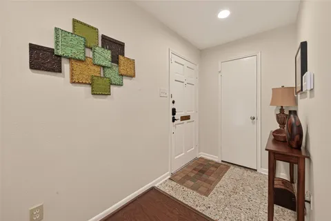 a kitchen with stainless steel appliances granite countertop a stove and a sink