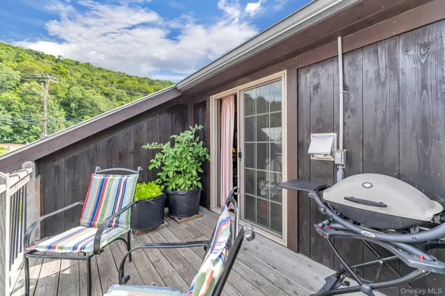 a outdoor living space with furniture and potted plants