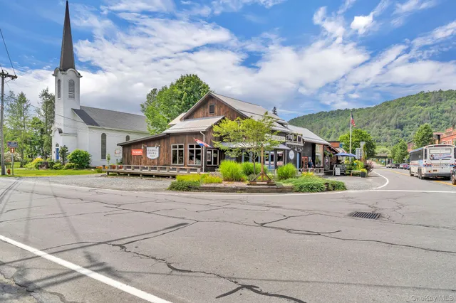 a front view of a building with garden
